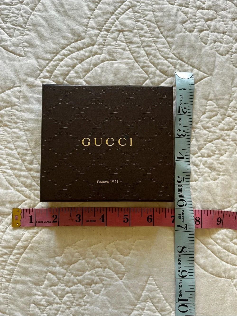 Gucci embossed pattern